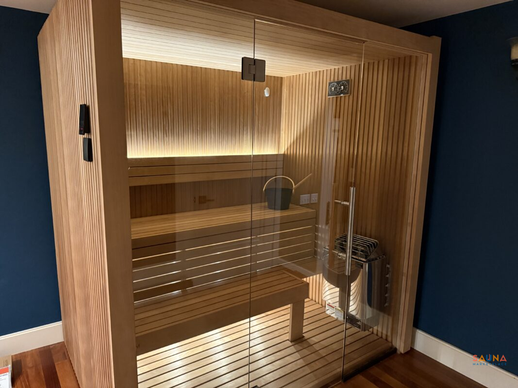 auroom libera glass in thermo aspen with harvia kip sauna heater